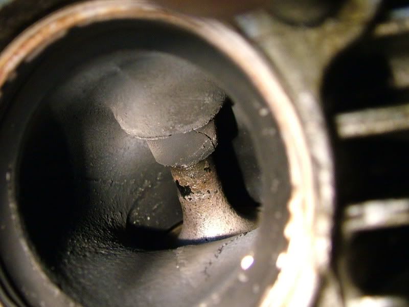 exhaust bucket sticking, cracked valve guide...bent valve?